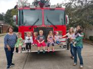 Kids in front of Fire truck